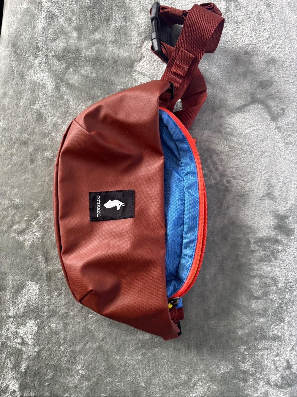 cotopaxi Rust Red Belt Bag with Blue Lining